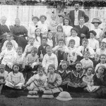 Baptist Mission school c1912 the year before Ray was born., Each of Ray's siblings Ken, Hazel and Gwen and represented by dots and Mervyn by a cross as he is held by Lillian and William George stands above it all.